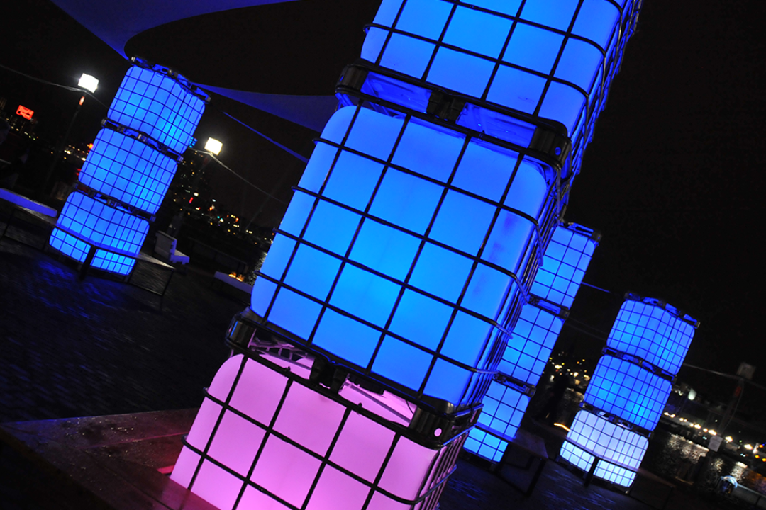 Large plastic cubes filled with blue and purple light