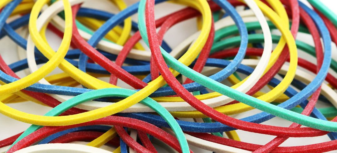 Close up of multi-colored rubber bands