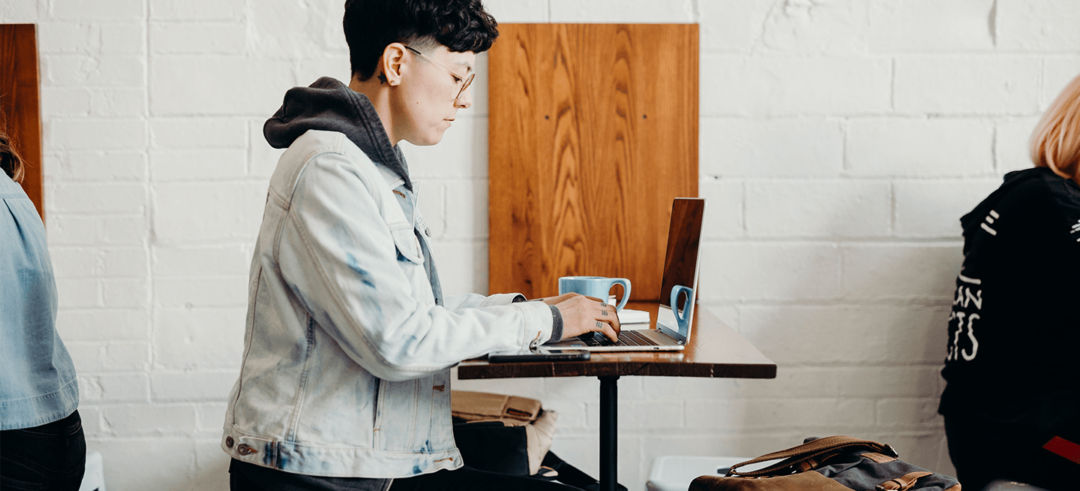 High school student using a laptop