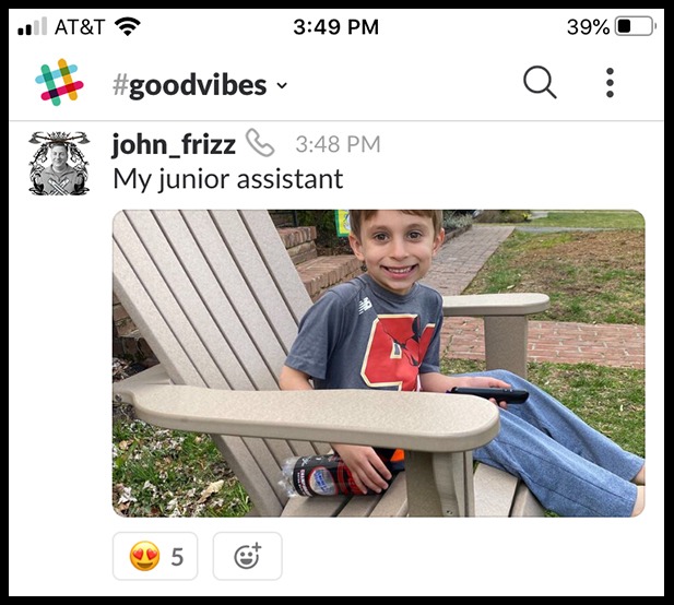 Photo of a kid sitting outside in a slack conversation