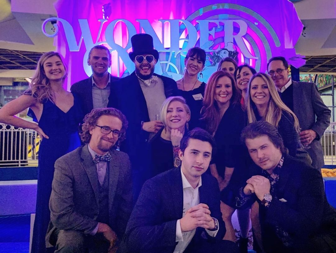 A dozen idfive team members pose at the 2020 Baltimore Addy award ceremony.