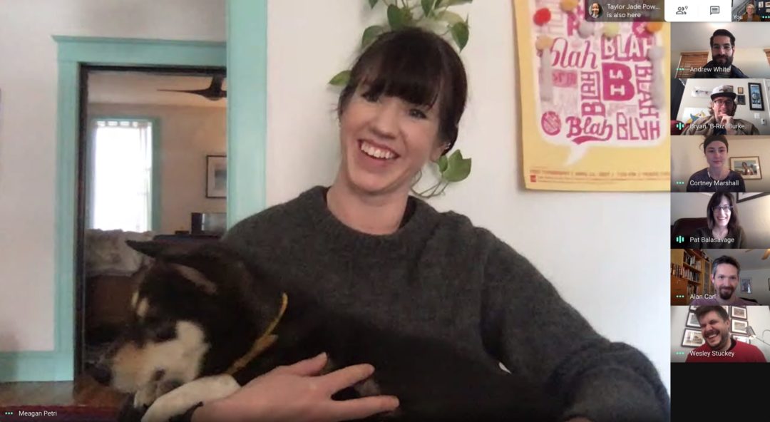 idfive Associate Creative Director Meagan Petri appears with her dog during a team video conference.