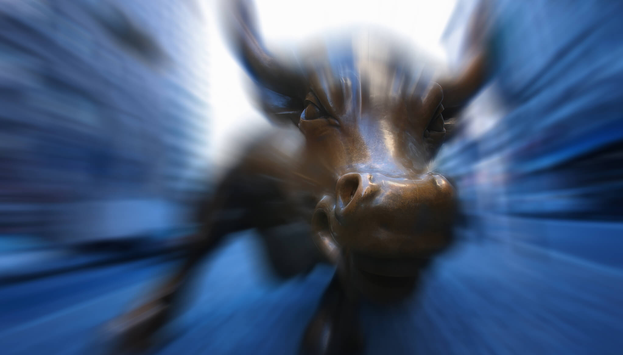 Wall Street bull statue with motion blur