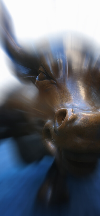 Wall Street bull statue with motion blur