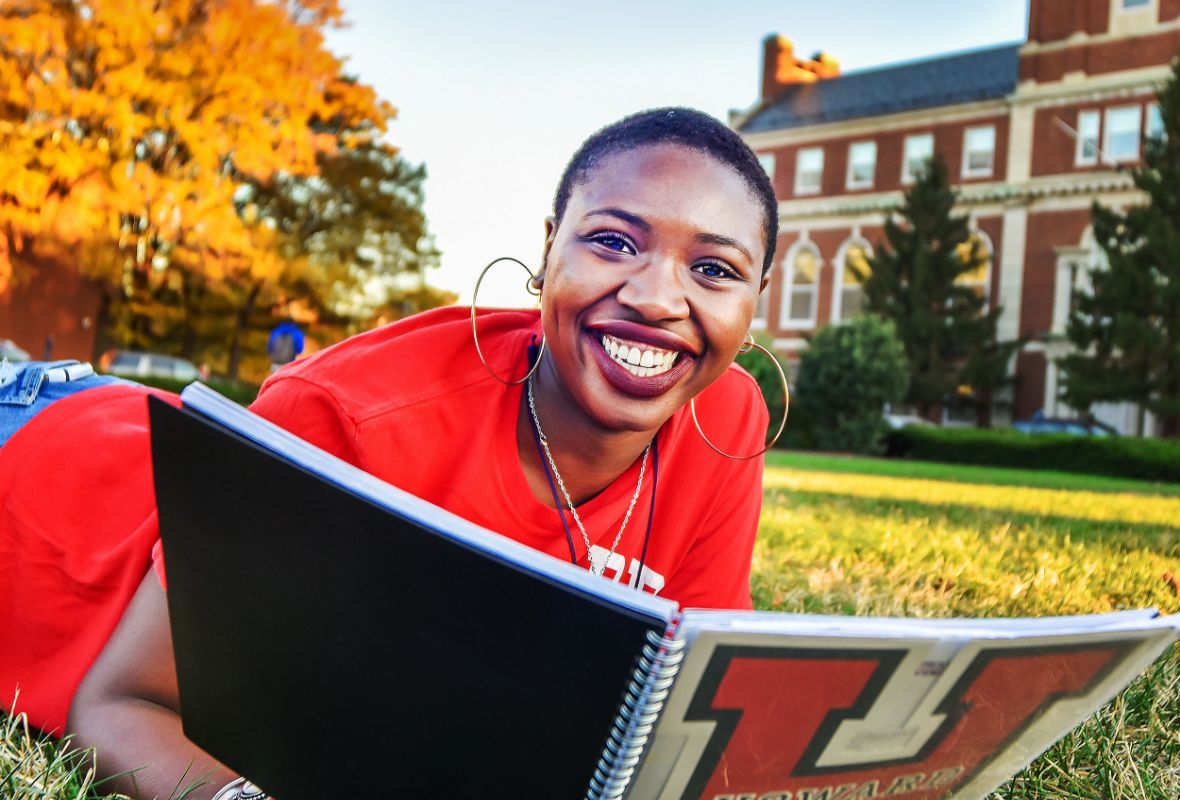 Howard student reading her planner