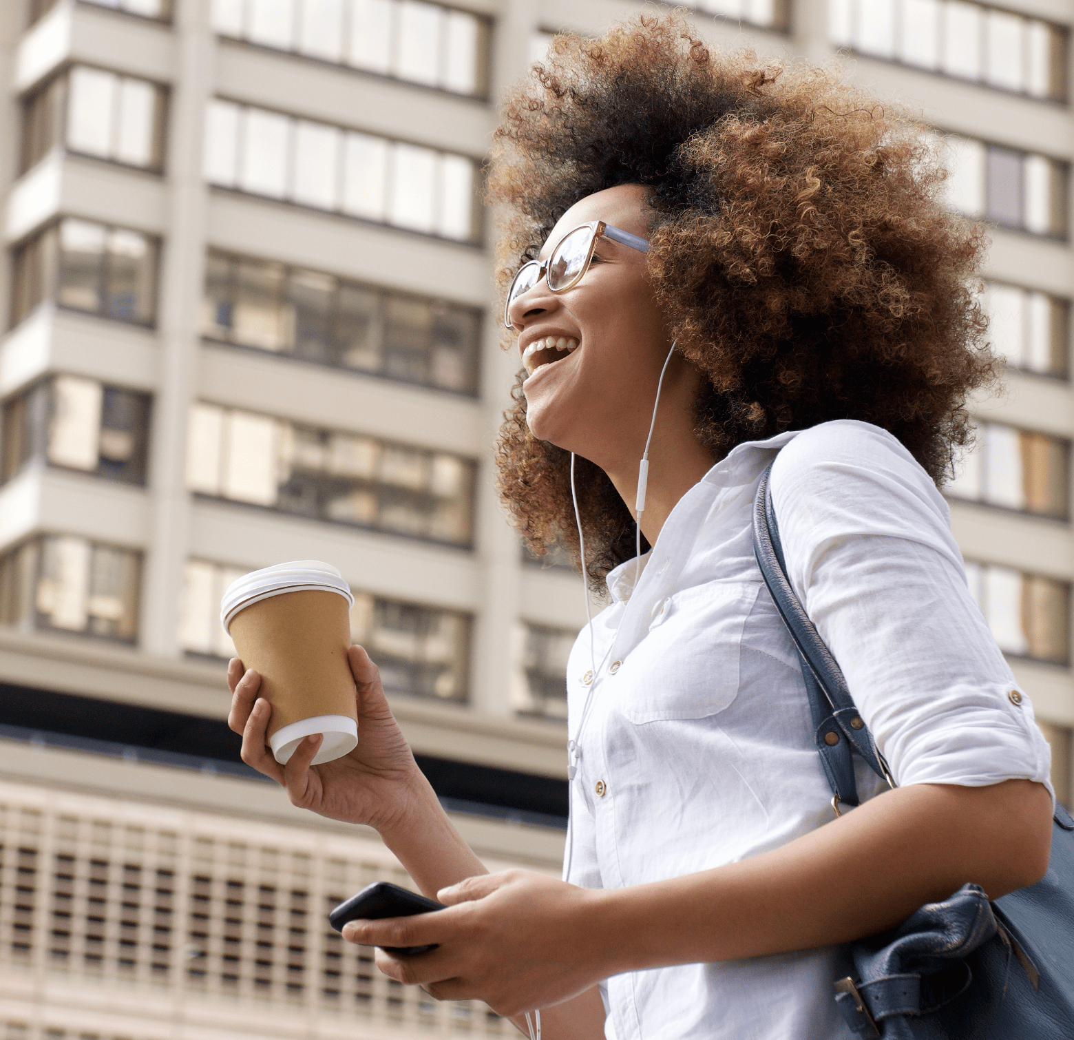 african american woman with light hair holding coffee