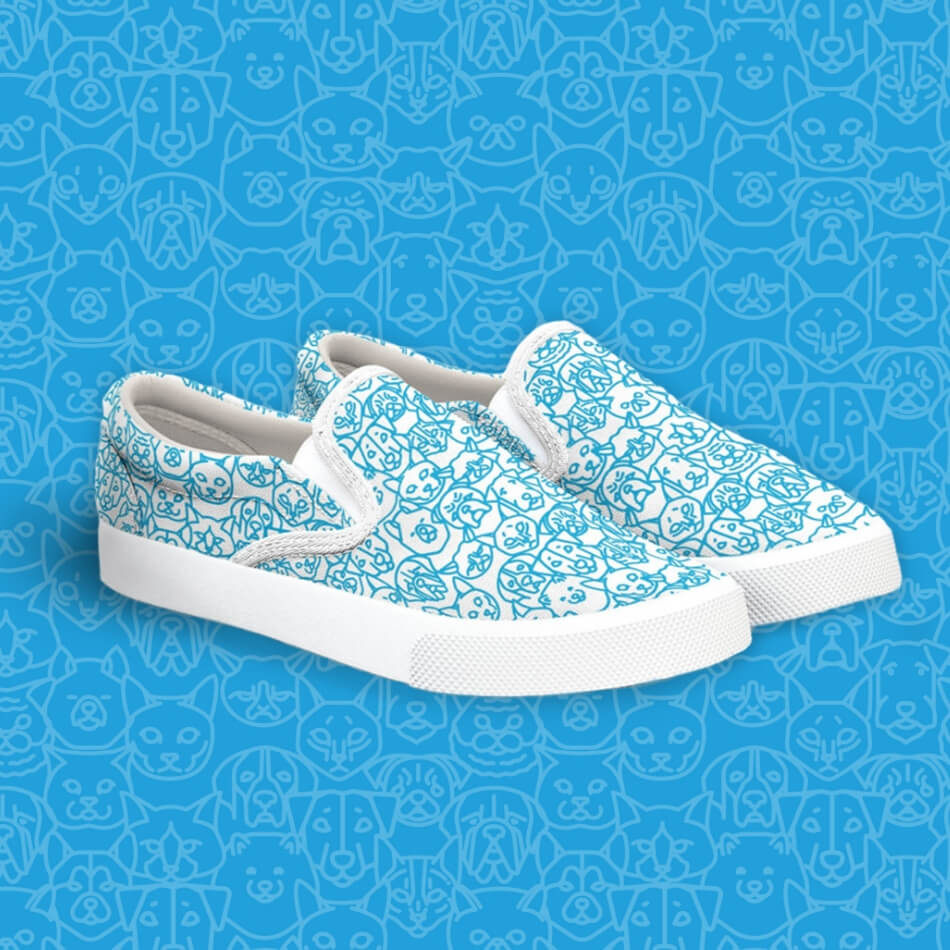 Shoes on a blue background with a dog and cat pattern.