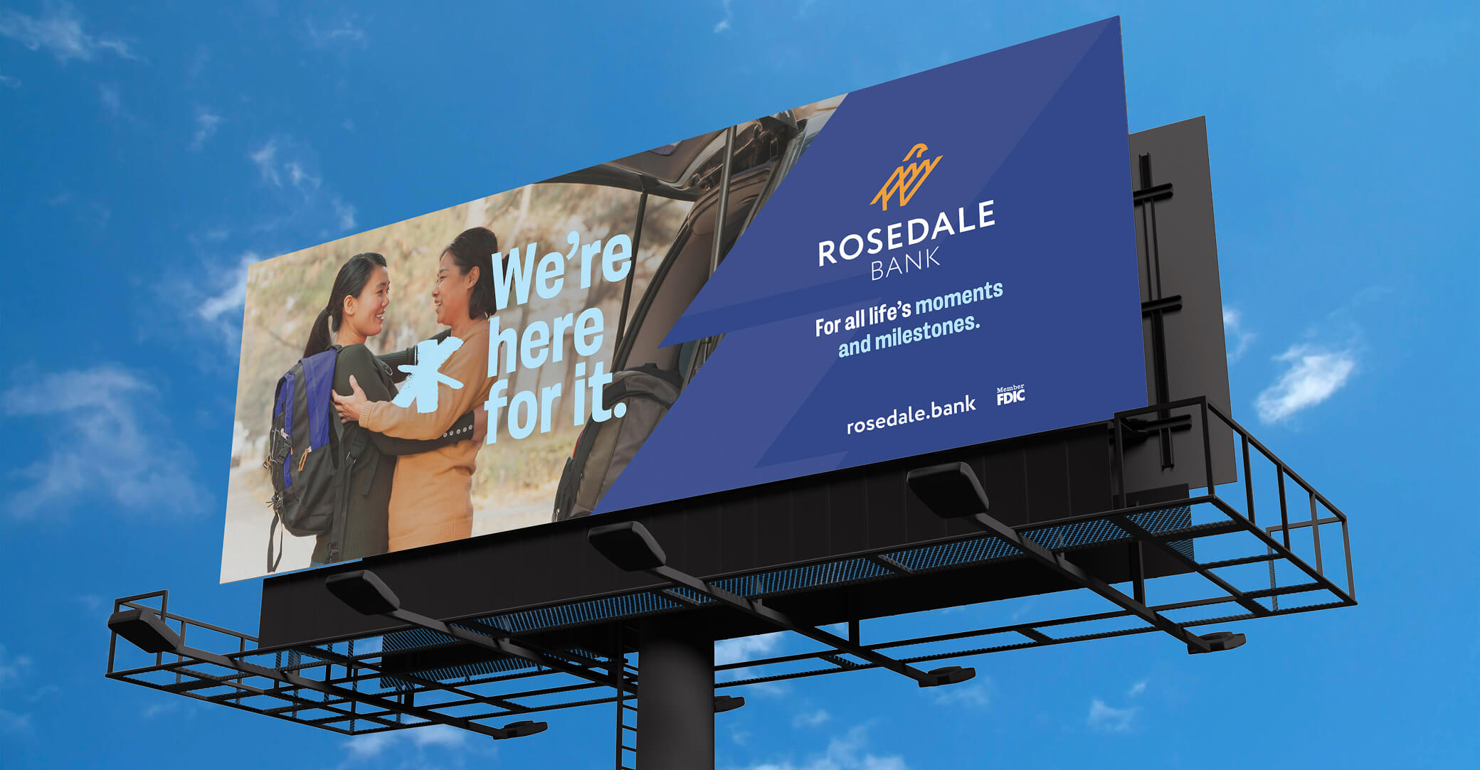 Large billboard ad for Rosedale Bank with clouds in background
